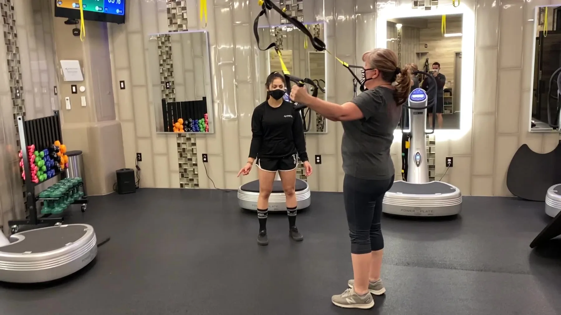 A client completing a Styku 3D body scan at Prestige Fitness